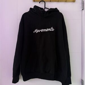 Movements Official Merch Black Hoodie